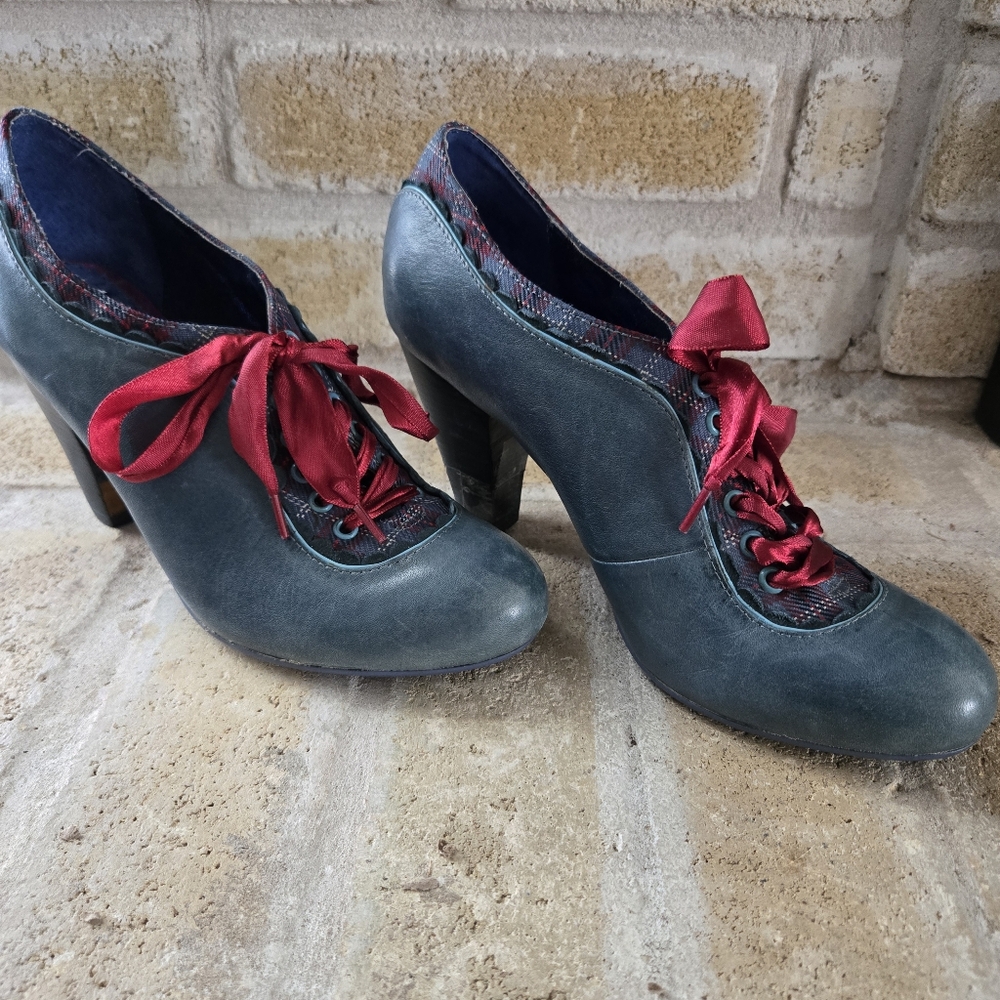Stylish Blue Heeled Shoes with Red Laces